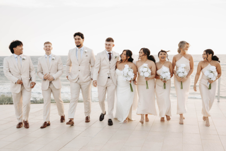 bridal party with stunning sunset