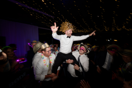 groom partying on the dance floor